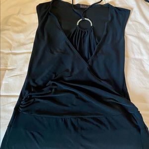Black dress.No need for jewelry.It’s both in one!